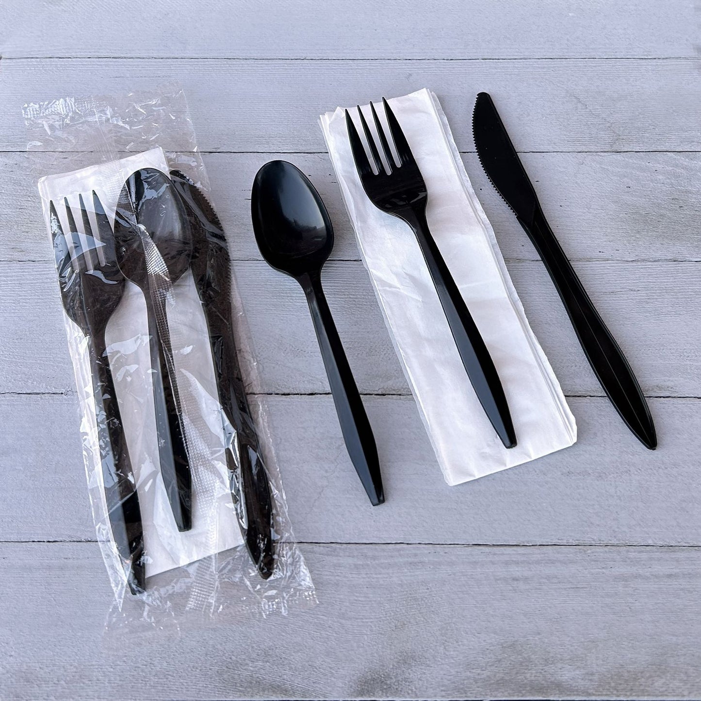 Boardwalk Four-Piece Cutlery Kit, Fork/Knife/Teaspoon/Napkin, Mediumweight, Black, 250/Carton (4KITBLPP)